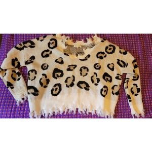 Miracle boutique brand distressed sweater